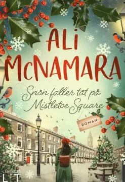 Snön faller tät på Mistletoe Square